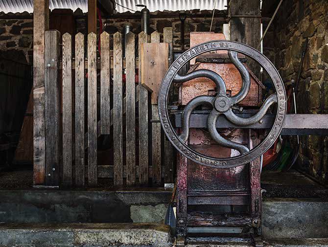 Vintage wine press wheel