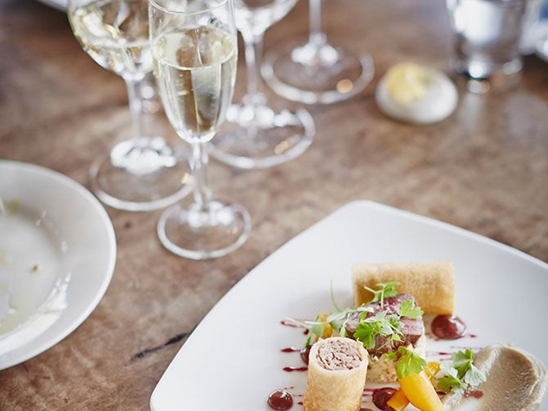 White wine with plate of food