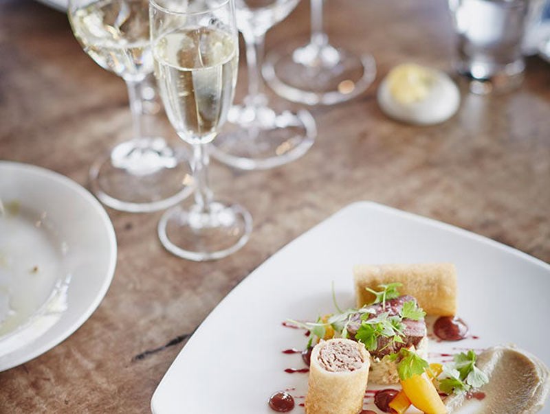White wine with plate of food
