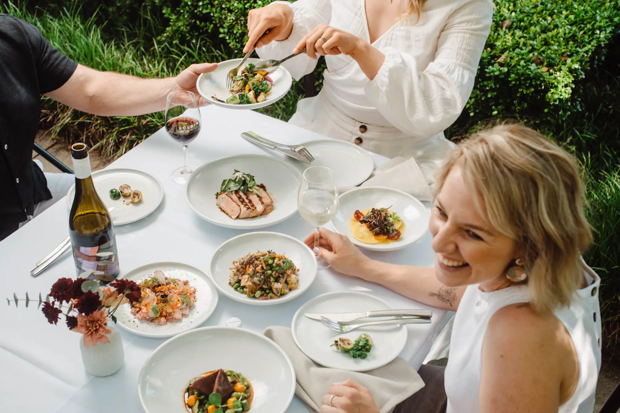 a group of people eating at a table