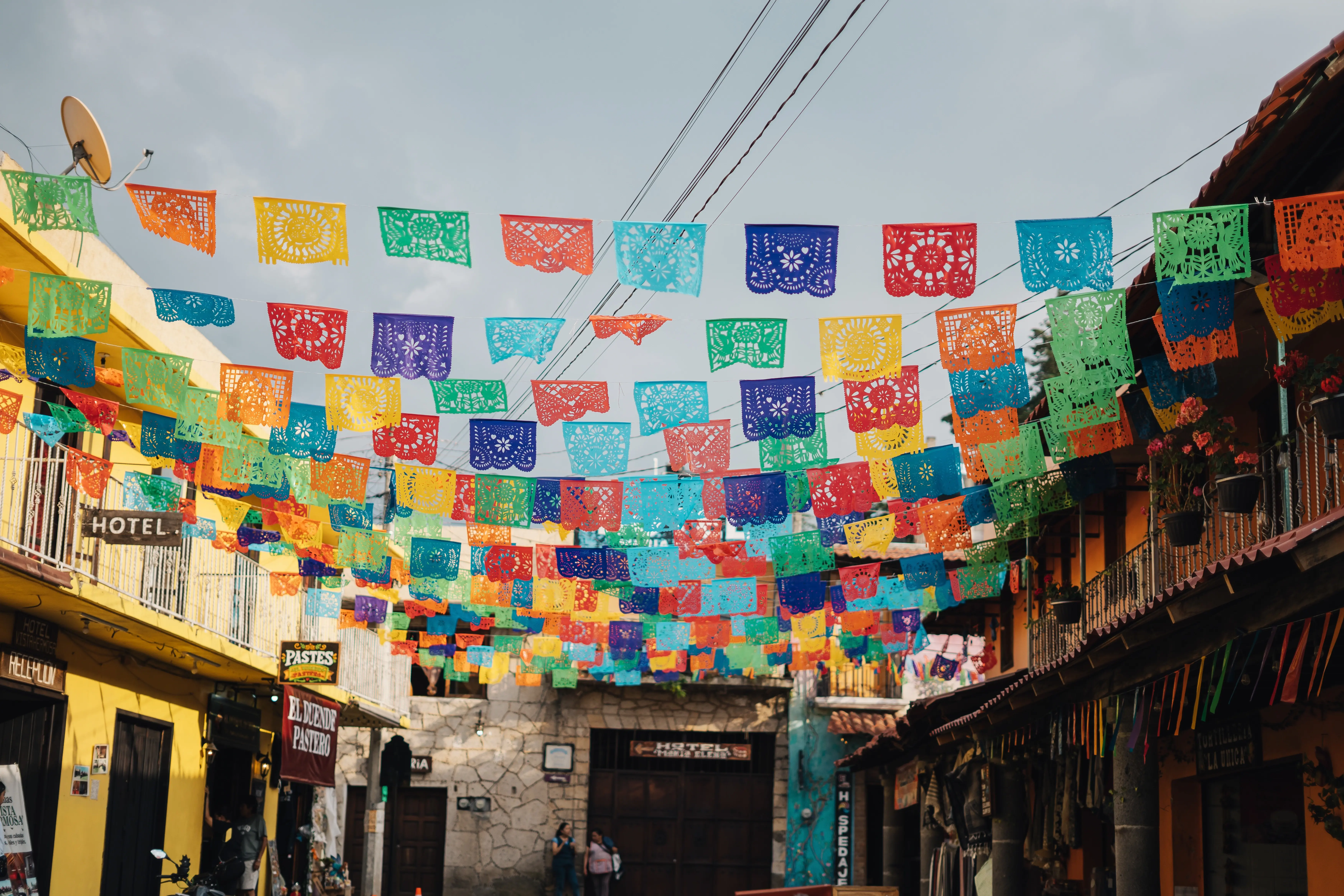 AdobeStock 2161568403 Mexico flags over a street