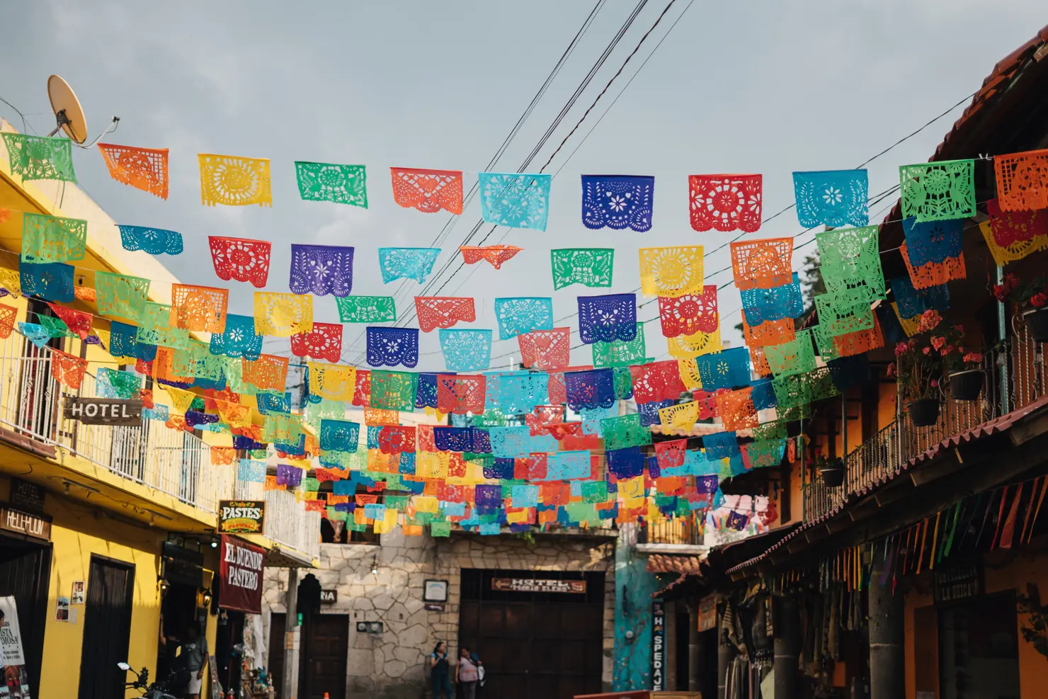 AdobeStock 2161568403 Mexico flags over a street