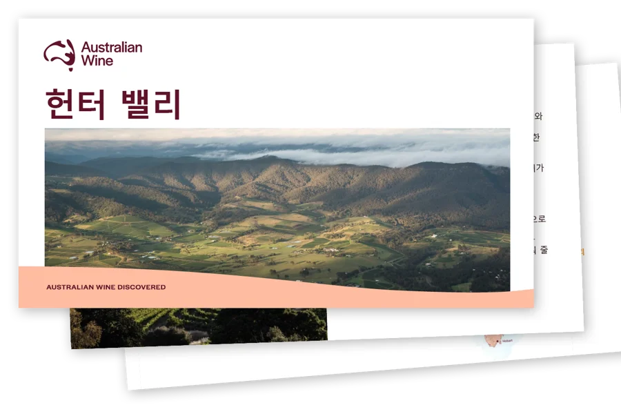 a landscape with mountains and clouds