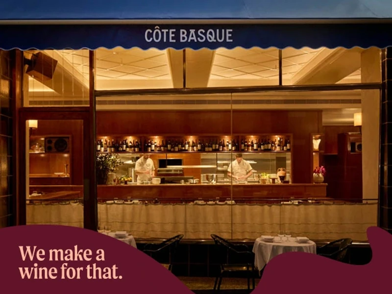 a restaurant with a chef behind the window