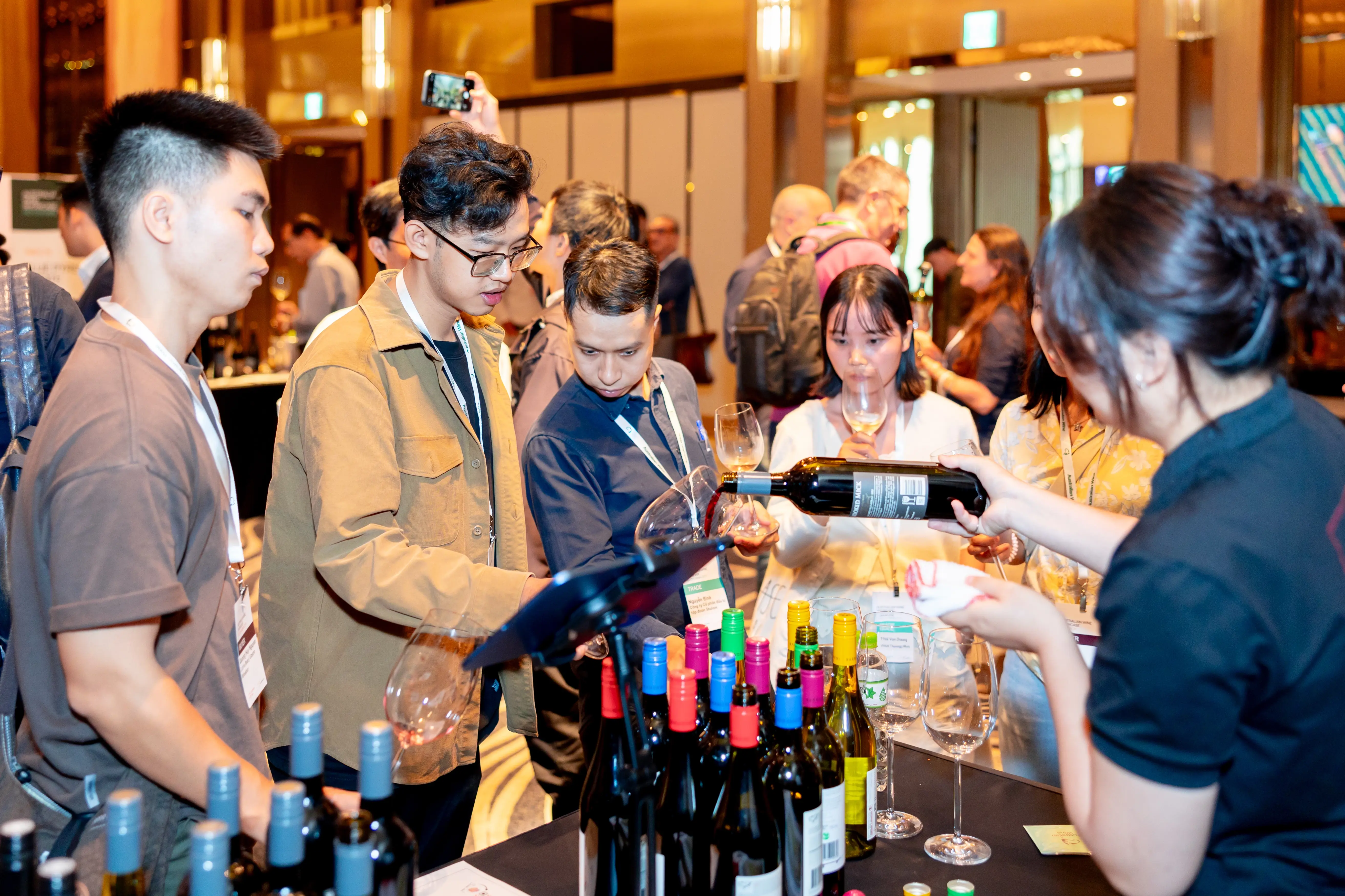 a group of people at a wine tasting event