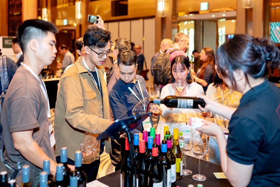 a group of people at a wine tasting event