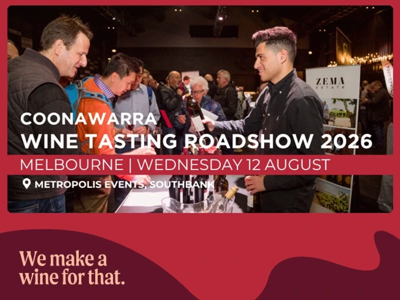 a group of men at a wine tasting event