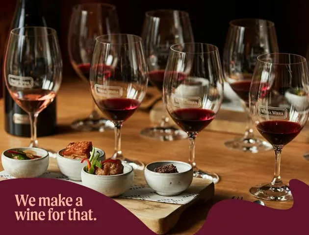 a group of wine glasses on a table