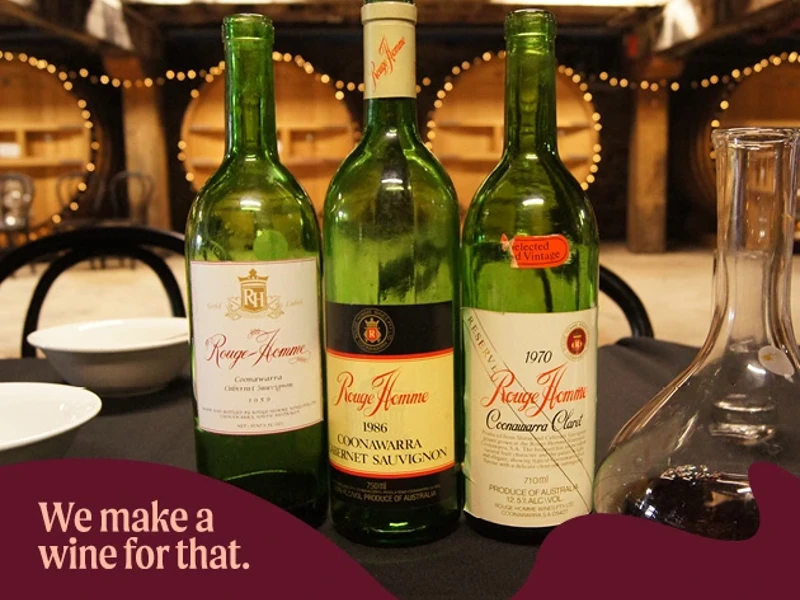 a group of wine bottles on a table