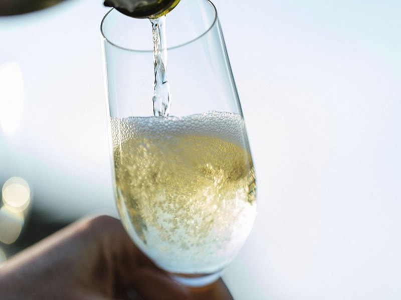 Sparkling wine being poured into glass