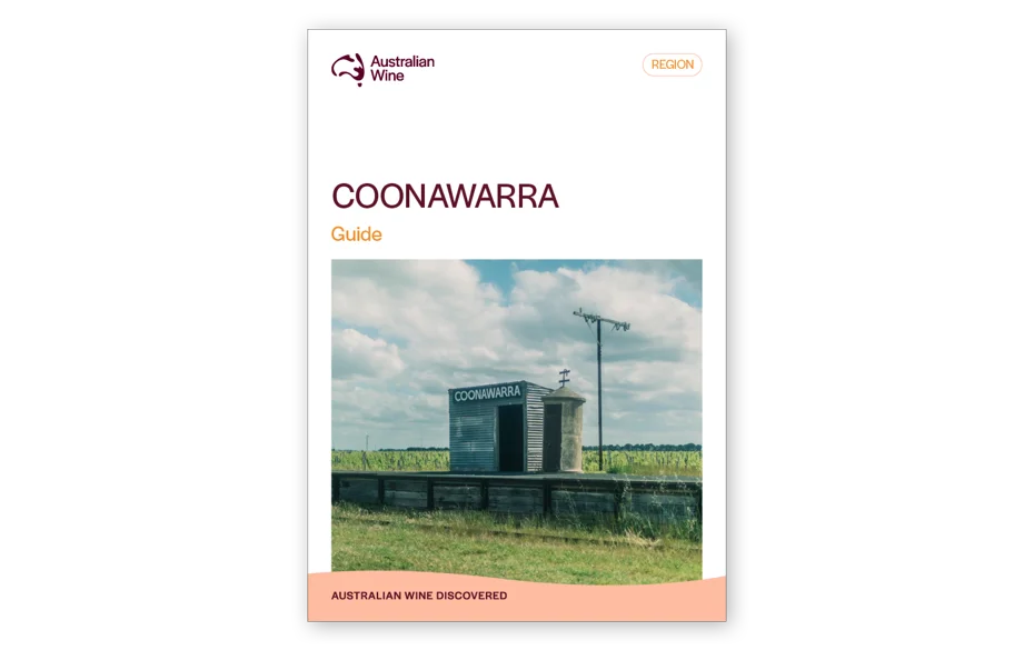 a book cover with a building and a field