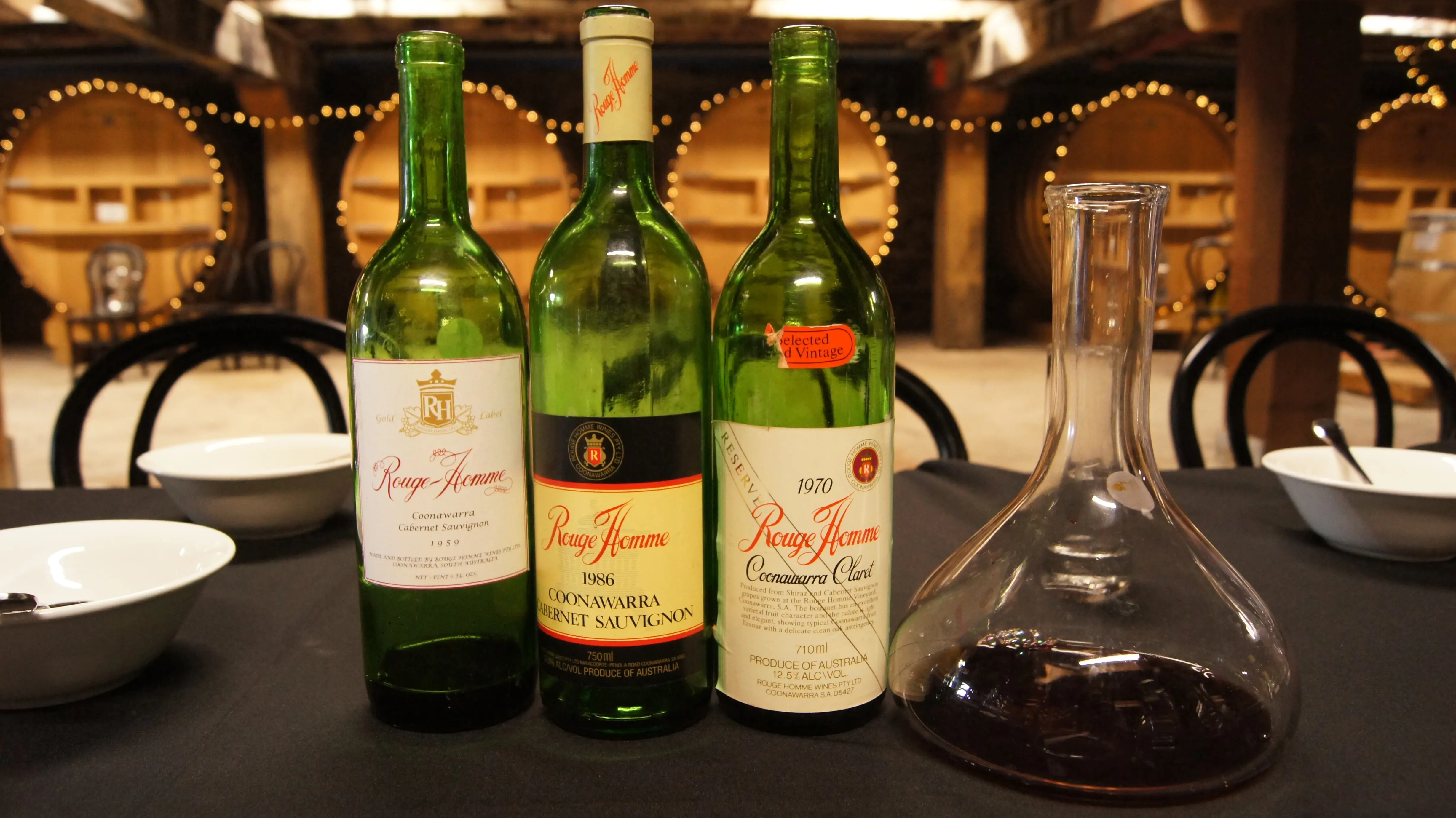 a group of wine bottles on a table