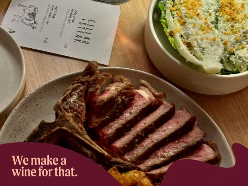 a plate of steak and salad