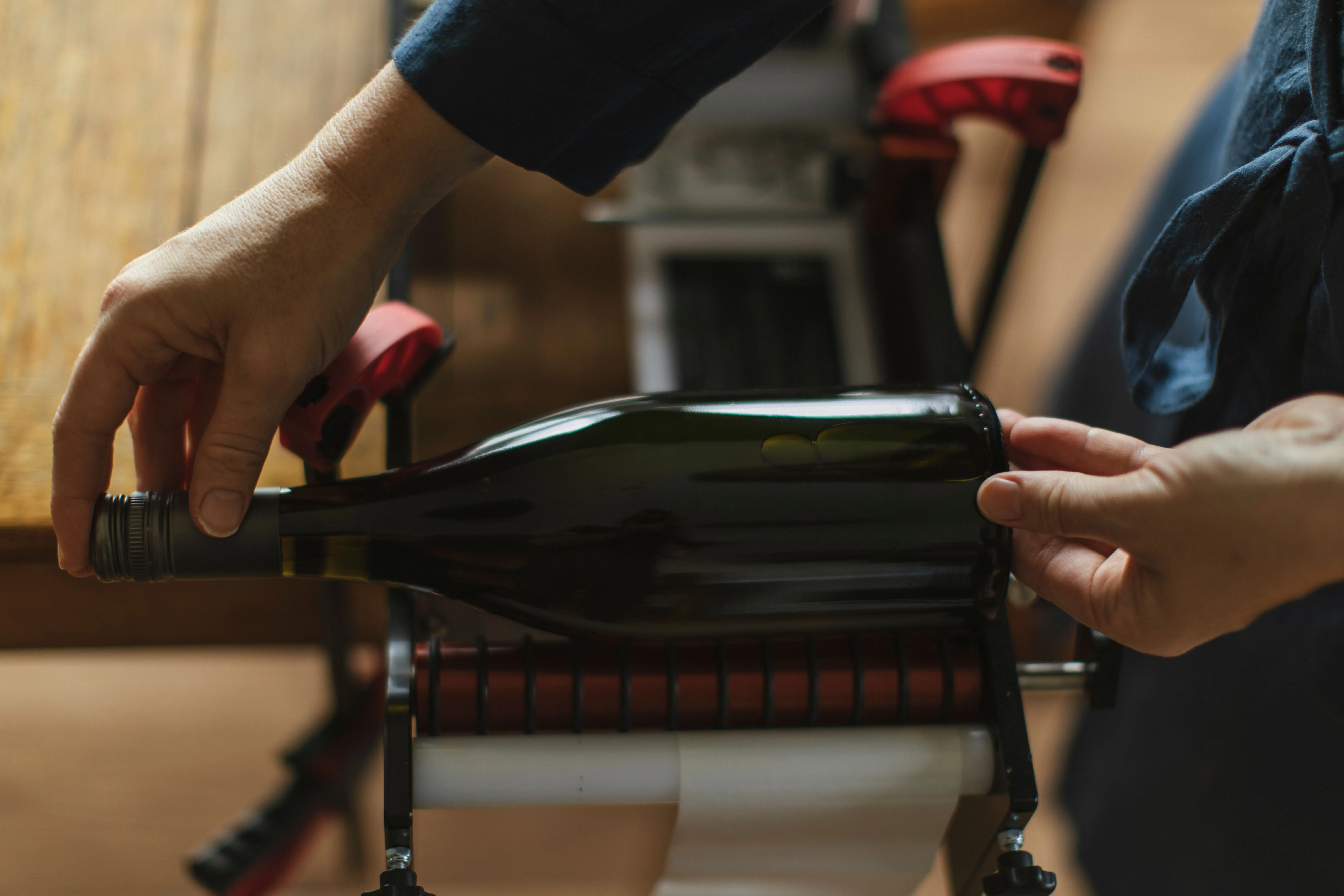 a person holding a bottle