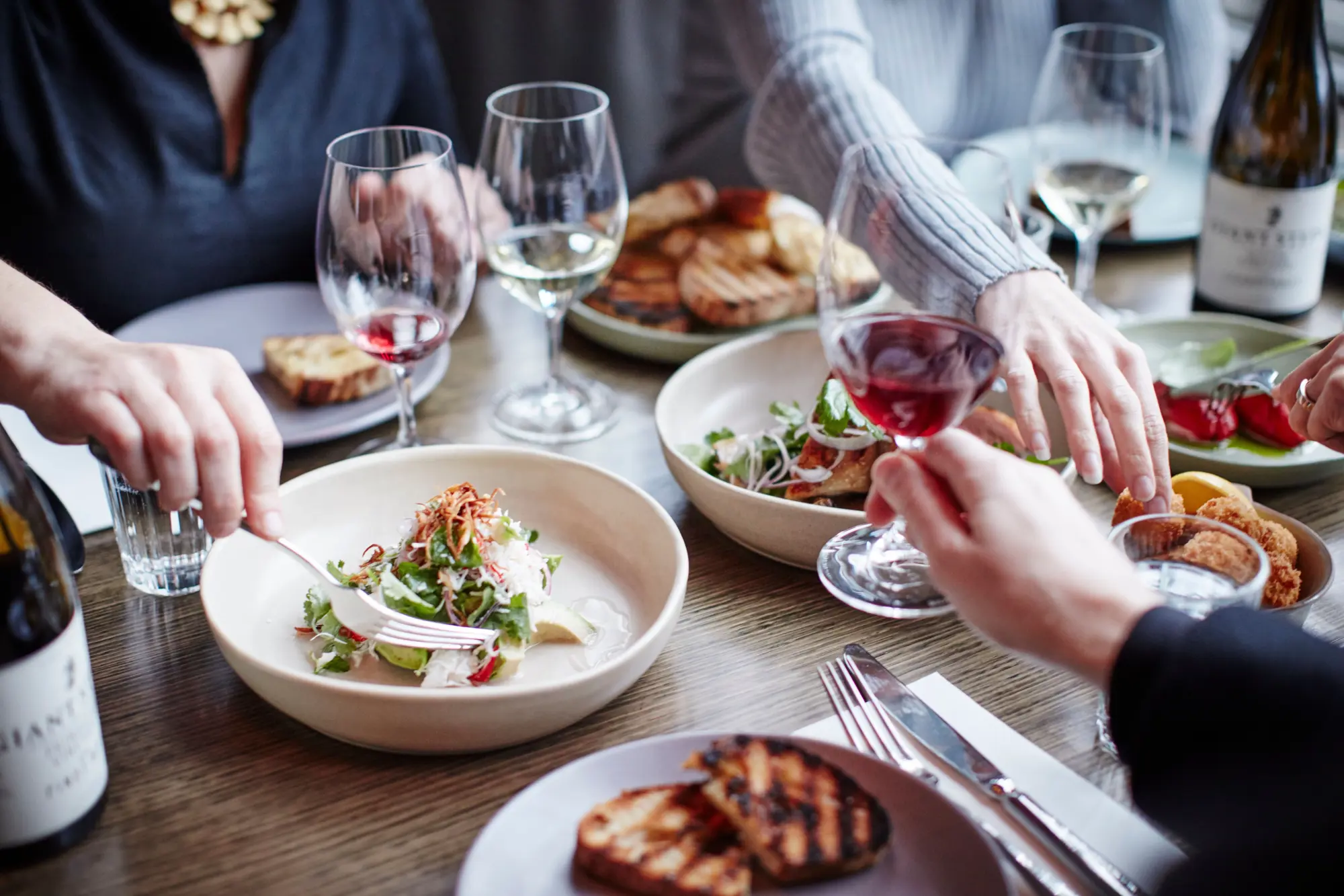 a group of people eating at a table