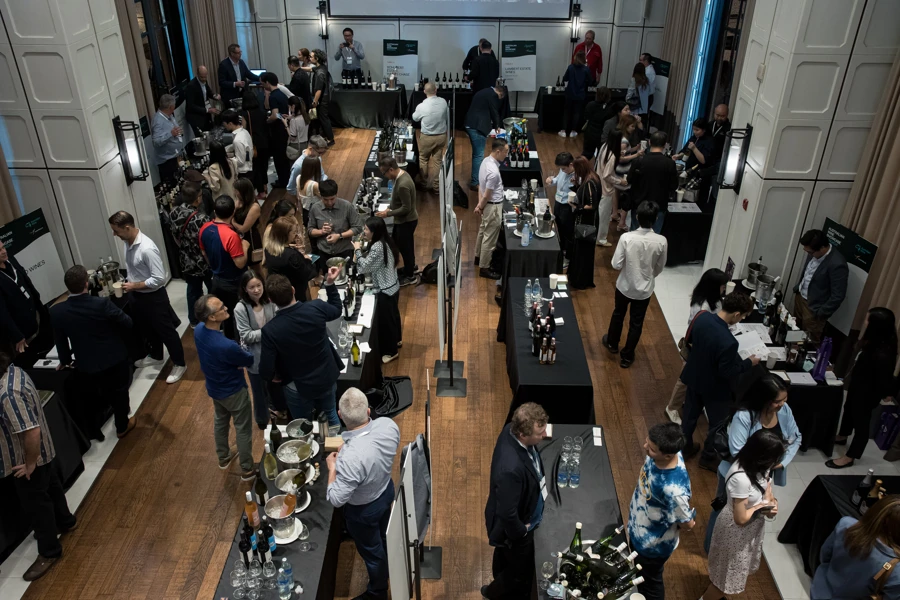 a group of people at a wine tasting event