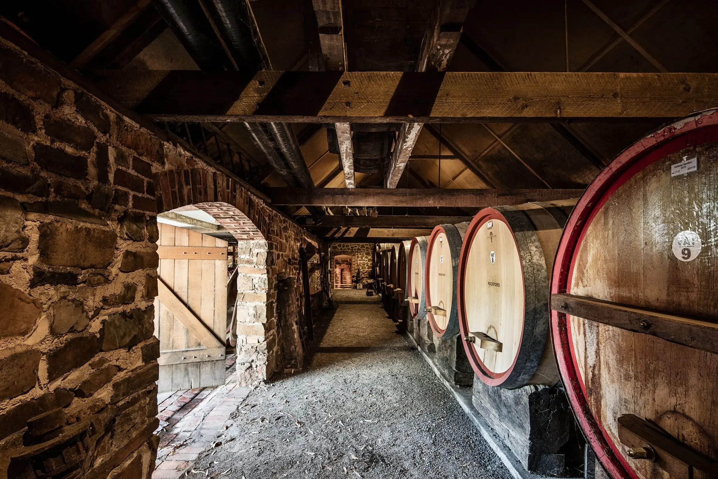 a row of barrels in a room