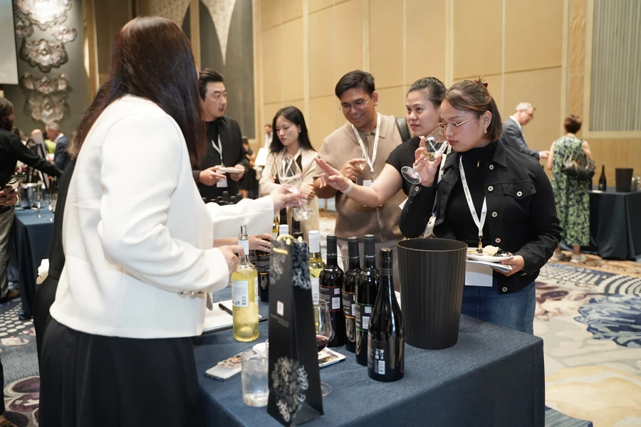 a group of people at a wine tasting event
