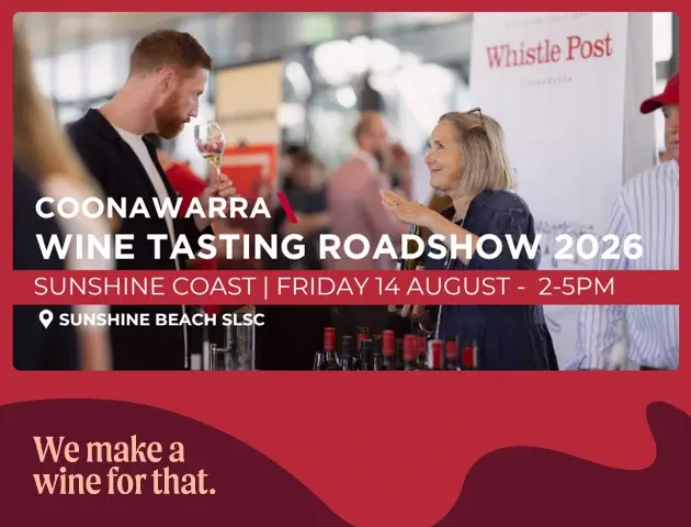 a man and woman at a wine tasting event