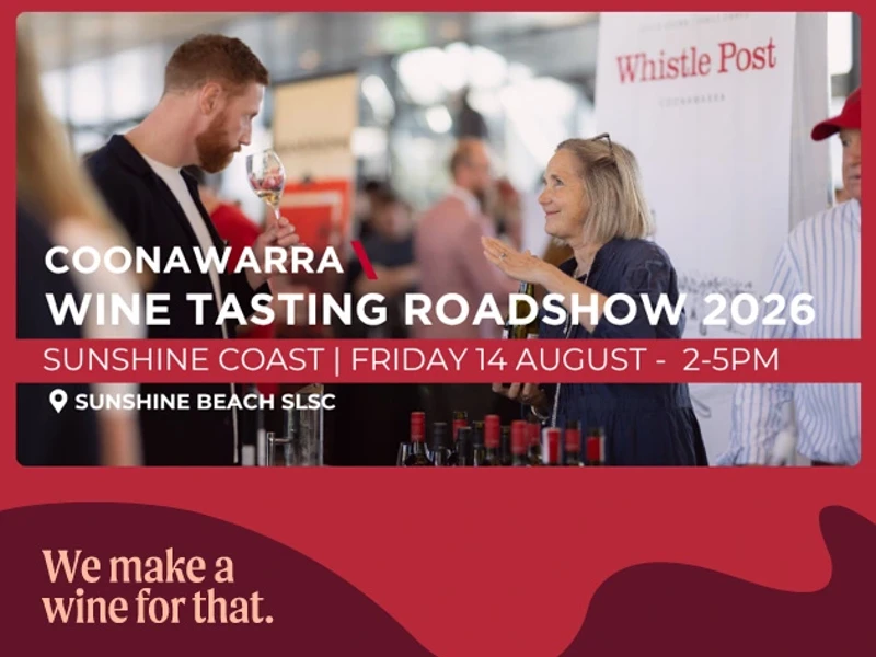 a man and woman at a wine tasting event