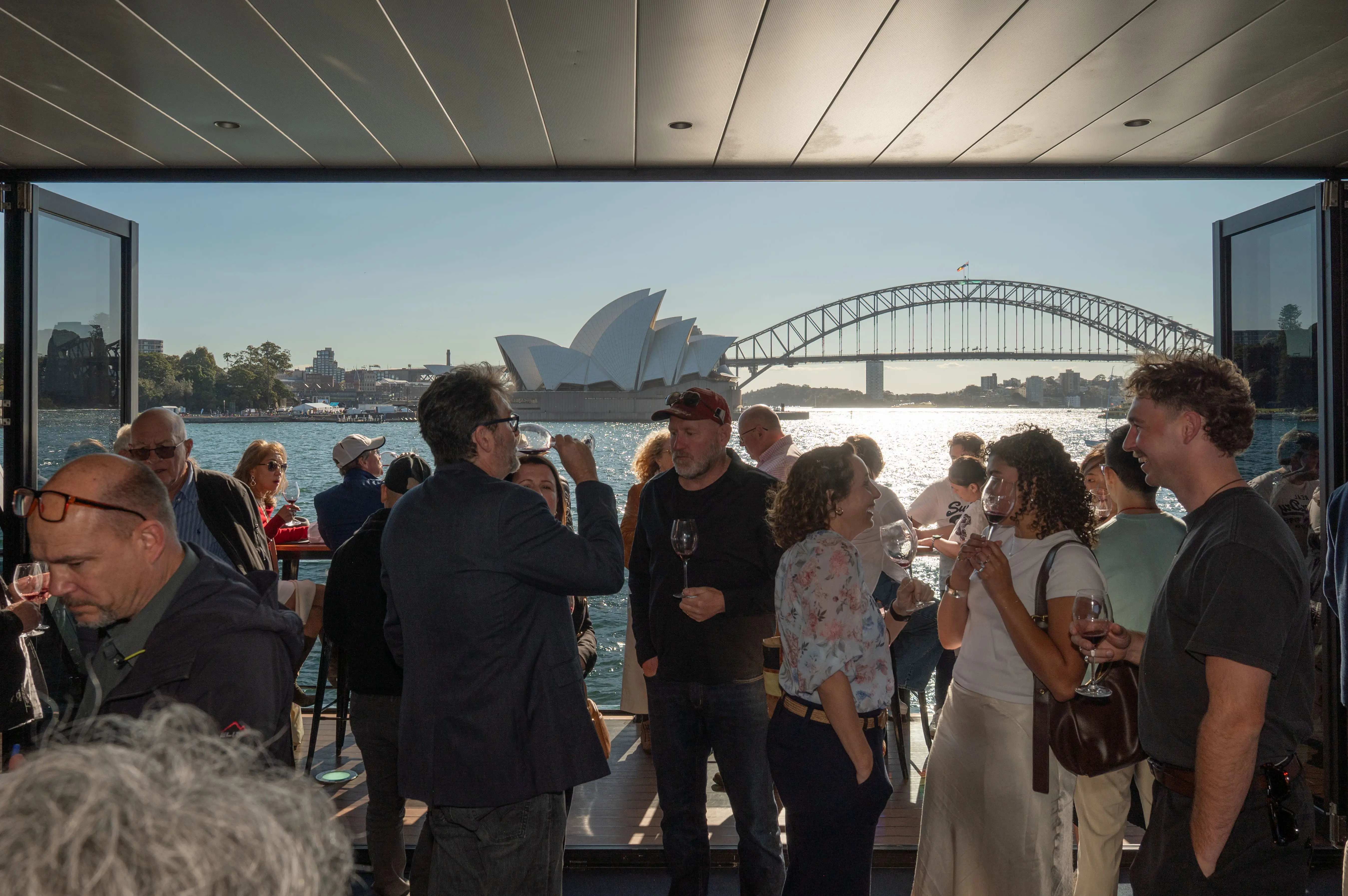 a group of people standing around a building