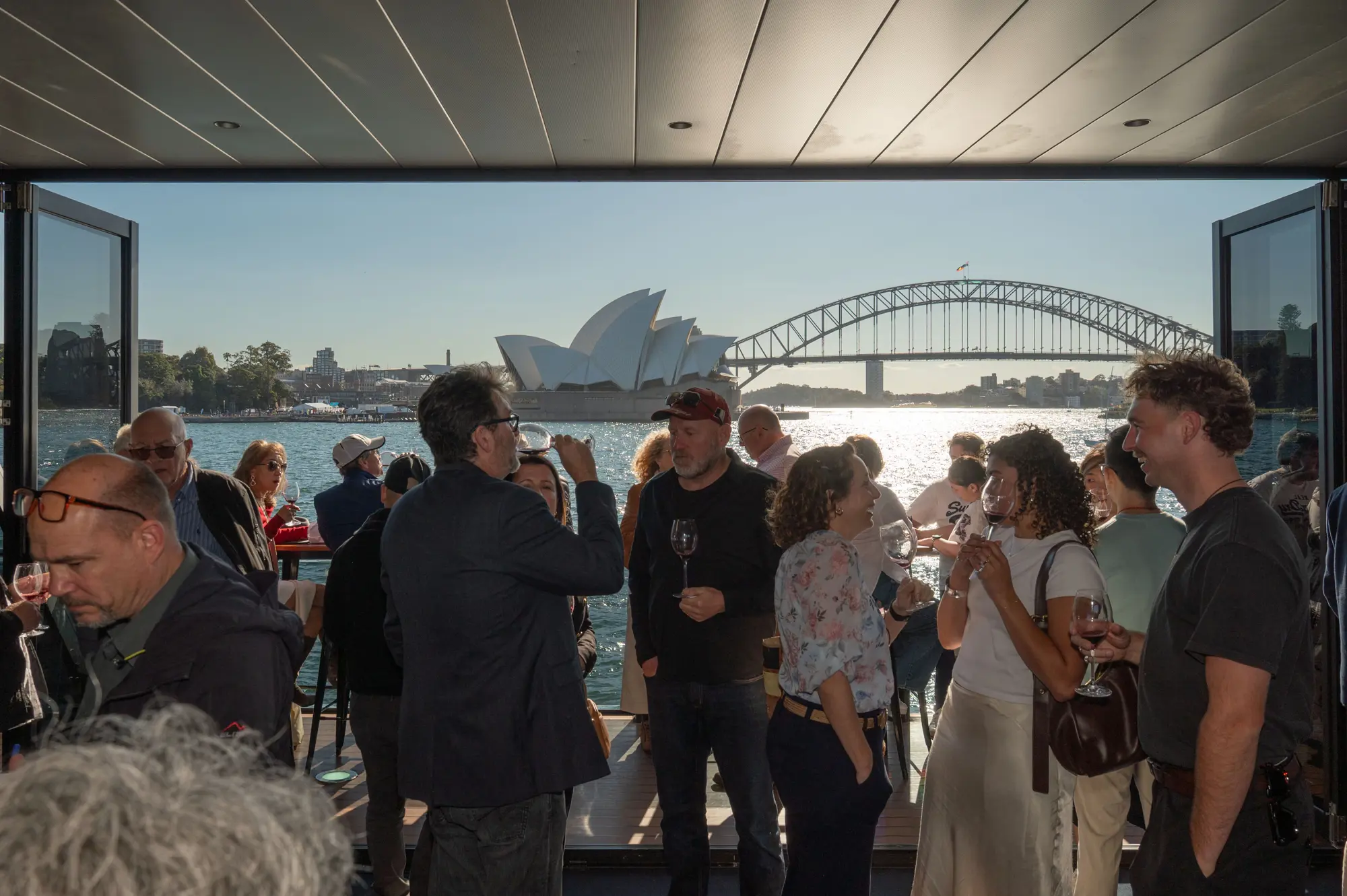 a group of people standing around a building