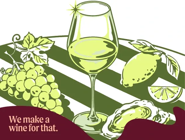 a glass of wine and grapes